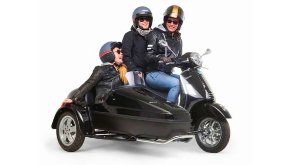 Vespa Riding in Threes with Sidecars by Congenia and Velorex